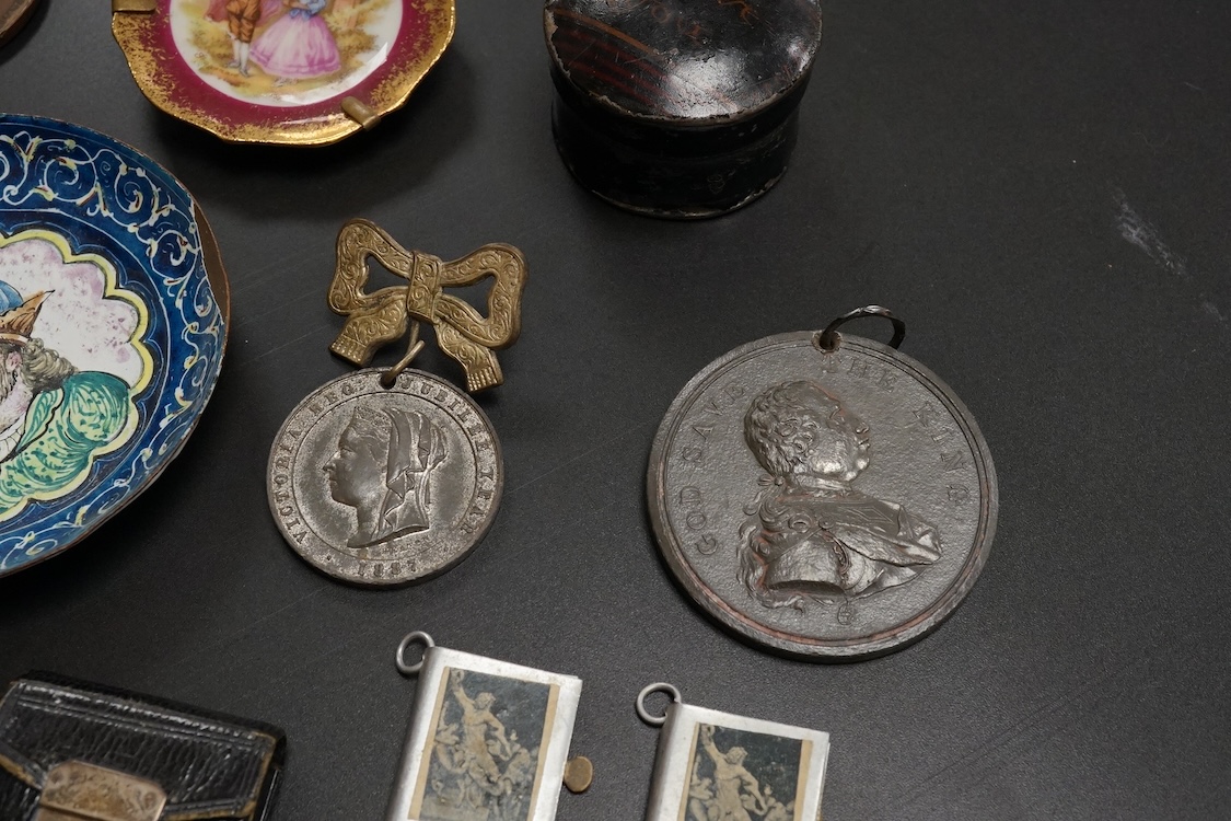 Objects of vertu and medals, including two Paris porcelain painted brooches, a leather cased almanac for 1827 and a painted ‘I Love You’ metal patch box